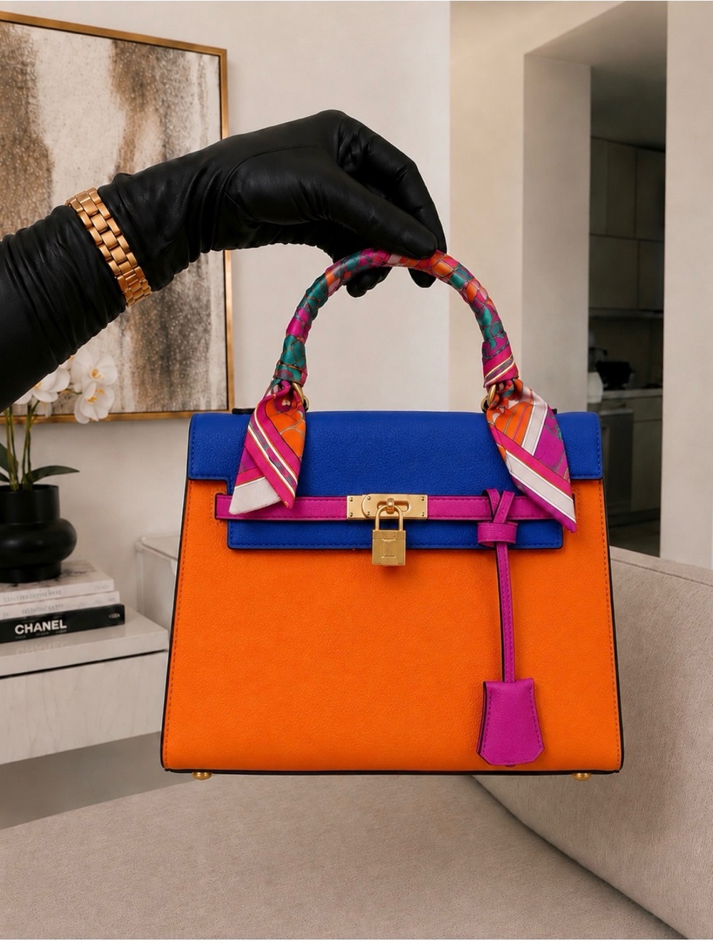 Luxury Orange & Blue Leather Top-Handle Bag with Pink Accents